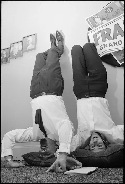 Franquin being interviewed standing on his head