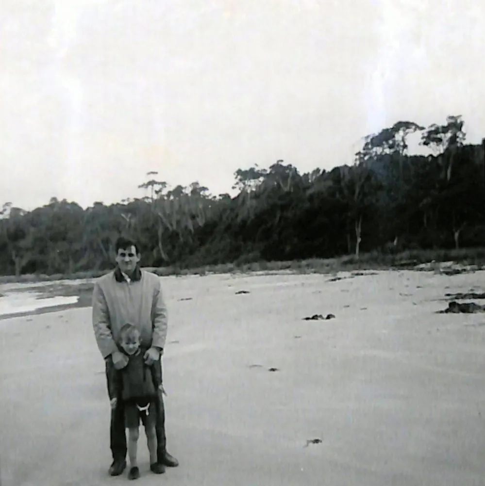 Allan Langston with his youngest son at Papatowai Beach, The Catlins.