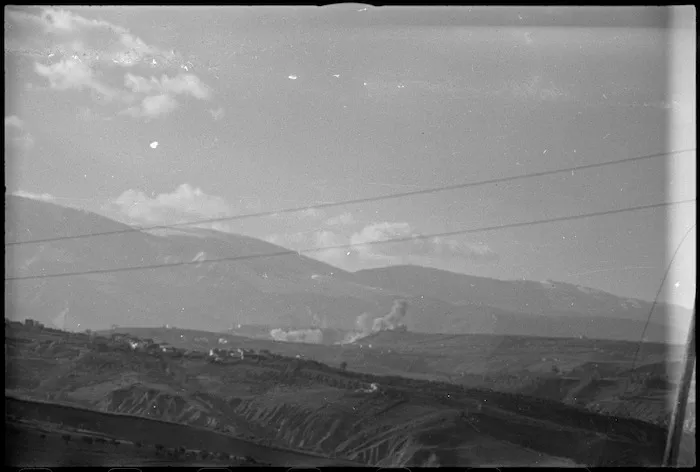 Smoke from Allied bombs landing on German positions at Guardiagrele on the Italian Front, World War II - Photograph taken by George Kaye
