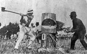Image: John Edward (Ned) Shewry Chopping Wood