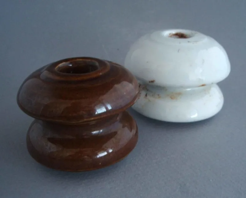 Pair of power pole insulators
