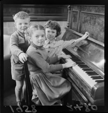 Image: Unidentified Russian children playing on a piano at the Russian Embassy, Wellington