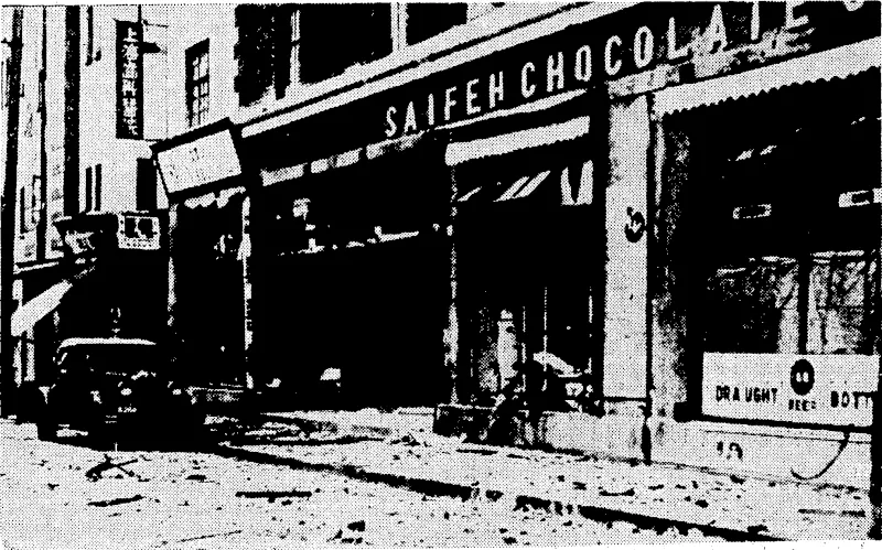Sydney Morning Herald" Photo. The North Szechuen Road, the Hongkew shopping cenirc^after it had been bombarded by Japanese. aeroplanes. \ (Evening Post, 23 September 1937)
