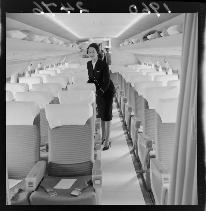 Air hostess, Pamela Salmon inside the new Tasman Empire Airways L-188 Electra aeroplane