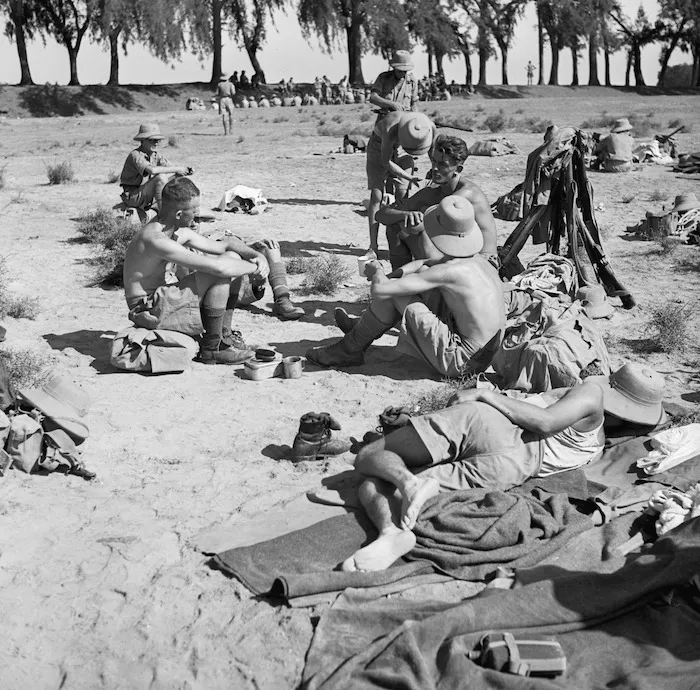 World War II troops resting from a route march in Egypt
