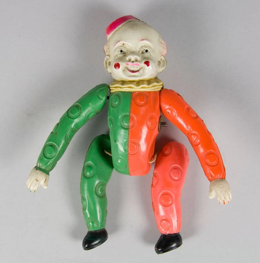Acrobatic clown toy