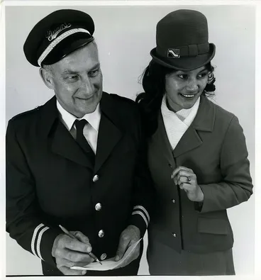 NZ Railways: Guard Tom Wood with hostess Leslie Turner Image: NZ Railways: Guard Tom Wood with hostess Leslie Turner