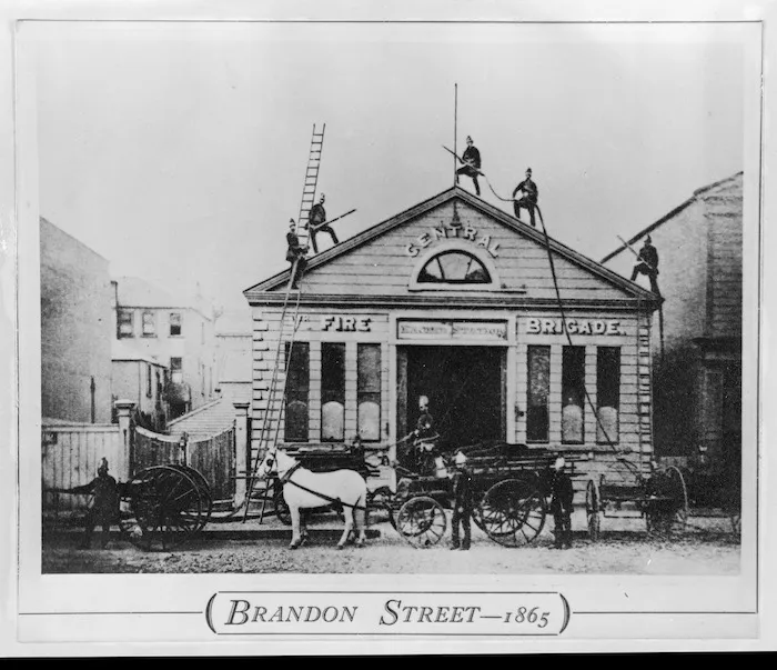Fire station of the Central Fire Brigade, Brandon Street, Wellington, with firemen and vehicles and equipment