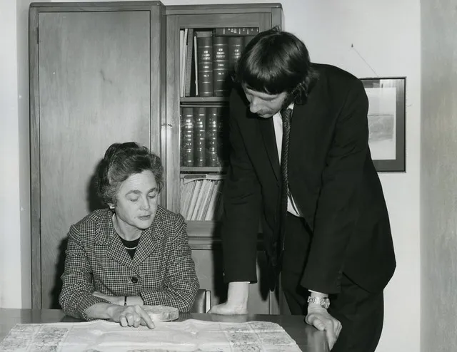Judith Hornabrook, Chief Archivist and archivist Owen Davie, examine the charter by which New Zealand was constituted a colony on 16 November 1840 (c1976)