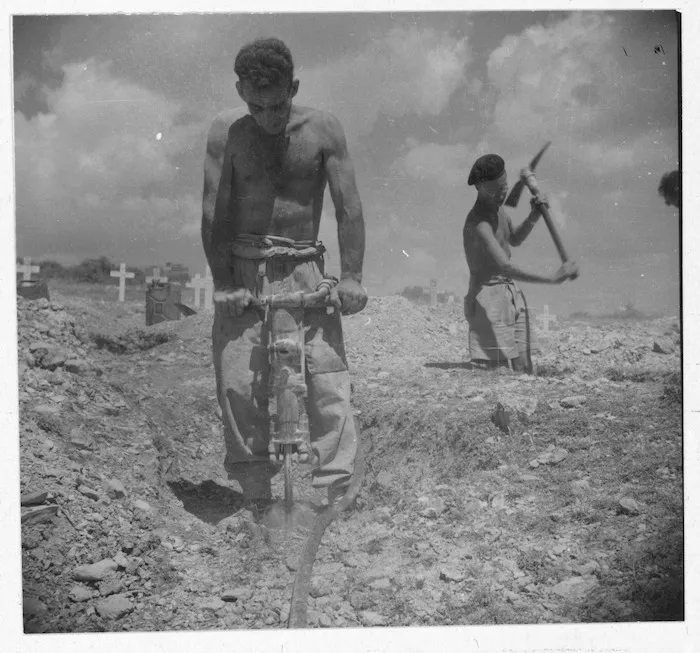 World War 2 New Zealand Engineers digging graves south of Florence, Italy - Photograph taken by K G Killoh