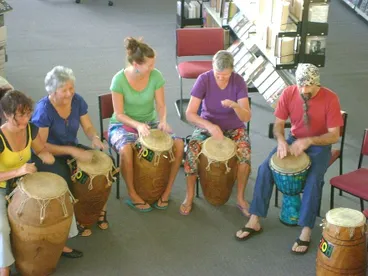 Image: Drumming in Levin Library