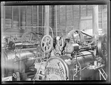 Image: Two steam engines with belts to drive machinery at the sawmill, Kakahi, Manawatu-Whanganui Region