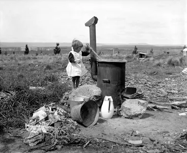 Image: Child stirring a copper, 1910