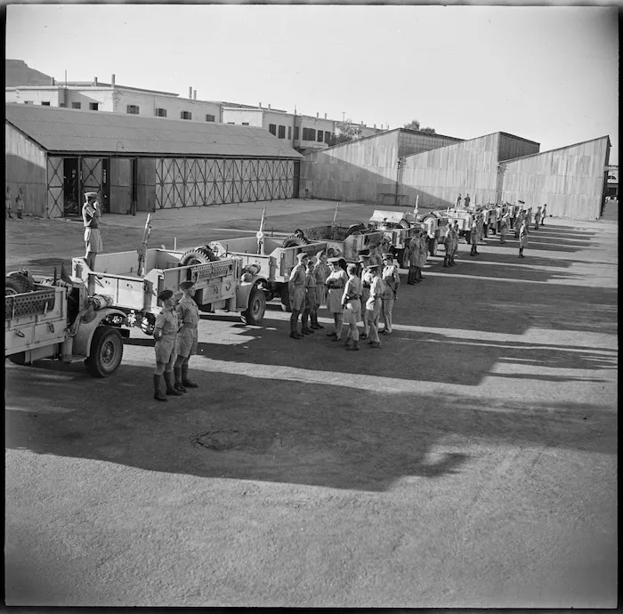 Trucks of one of the NZ LRDG patrols drawn up for review in Cairo