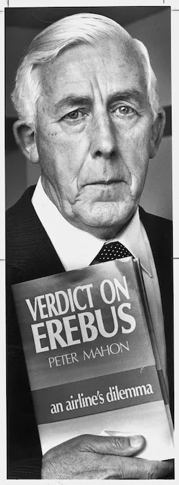 Former High Court judge, and Head of the Commission of Enquiry into the Erebus disaster, Peter Mahon, with his book Verdict on Erebus - Photograph taken by Ray Pigney