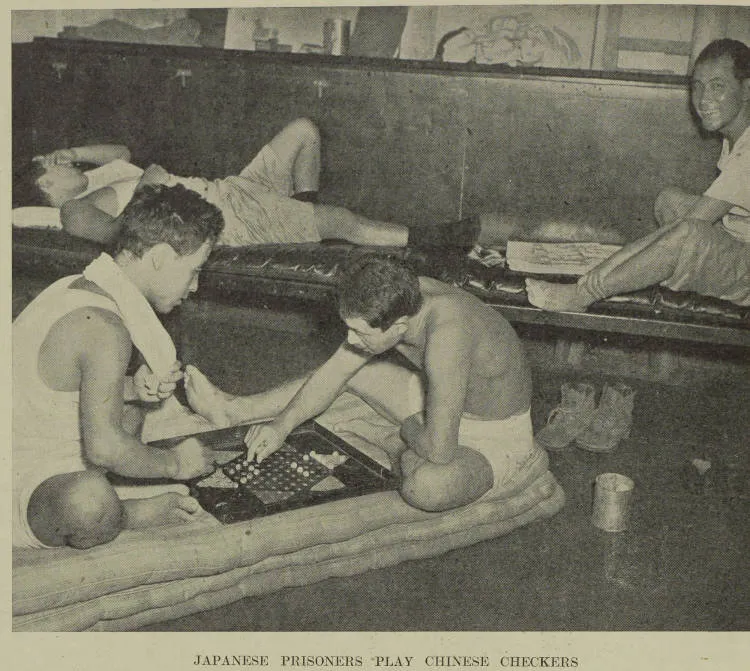 Japanese prisoners play Chinese Checkers