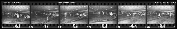 Bowlers at a ten pin bowling alley