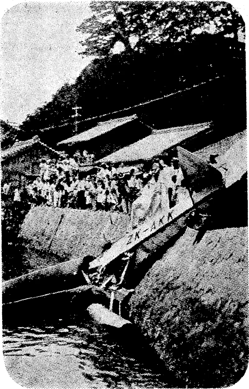 CHICHESTER COMES TO GRIEF. The end of Mr F. C. Chichester's attempt to fly from New Zealand to England via Japan. The accident occurred at ■' Katsuura, about 60 miles from Osaka. One float caught in an electric cable and was torn off, the plane diving into the water and hitting the sea wall. (Ellesmere Guardian, 09 February 1932)