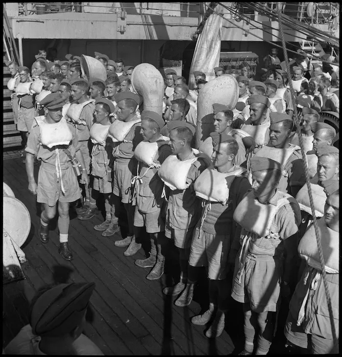 Inspection at lifeboat stations on transport taking 2 NZ Division personnel to Italy, World War II