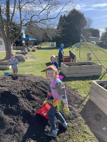 Image: Loading up the Compost