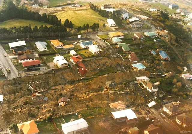 Abbotsford Landslide - looking across slip area with Gordon Street on left and Charles Street in right background, 10 August 1979