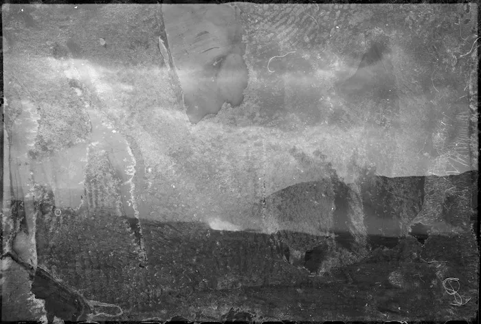 Shafts of sunlight strike through the smoke screen laid around Cassino, Italy, World War II - Photograph taken by George Kaye