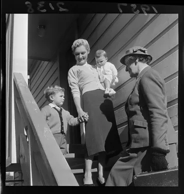 Image: The Royal New Zealand Plunket Society, nurse on a visit to Mrs Jacobson and her two young children, {Wellington?]