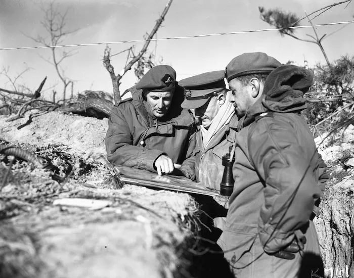 [Brigadier R S Park, Major R McK Paterson and Lieutenant-Colonel J W Moodie at a forward observation post, Korea]