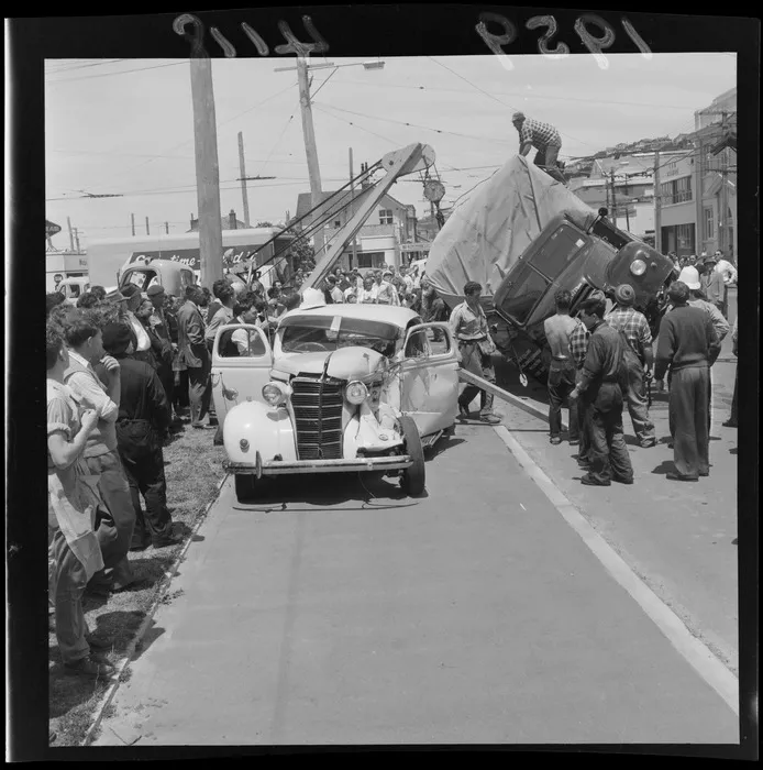 Overturned truck and damaged car after a road accident in Kilbirnie, Wellington