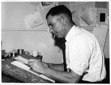 Image: Cartoonist George Duncan Henderson at work