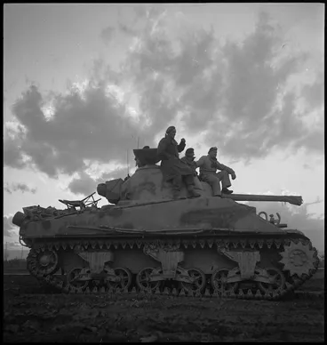 Image: Tank moving forward to cross the bridge over the Sangro in Italy, World War II - Photograph taken by George Kaye