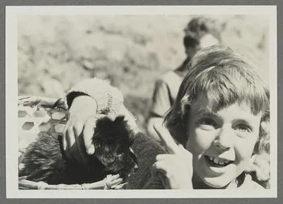 [Belinda Hillary with puppy]