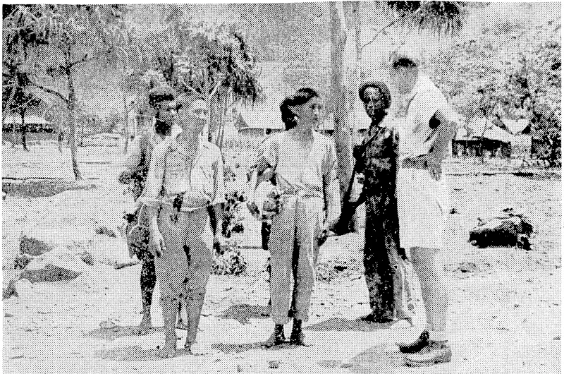 Japanese prisoners being interrogated by a Netherlands Indies civil'administration officer in But civ New Guinea. The prisoners .are under the escort of tivo Papuan guards and an Indonesian soldier. (Evening Post, 10 July 1945)