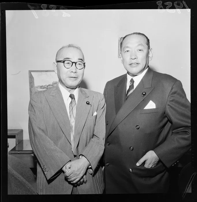 Two Japanese politicians Mr Nomizo and Mr Chita