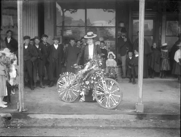 Image: Woman with decorated bicycle