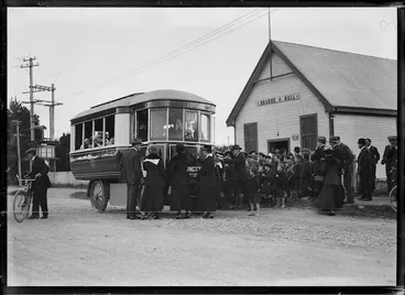 Image: Children boarding an Edison electric bus outside the Orange Hall, Hornby, Christchurch