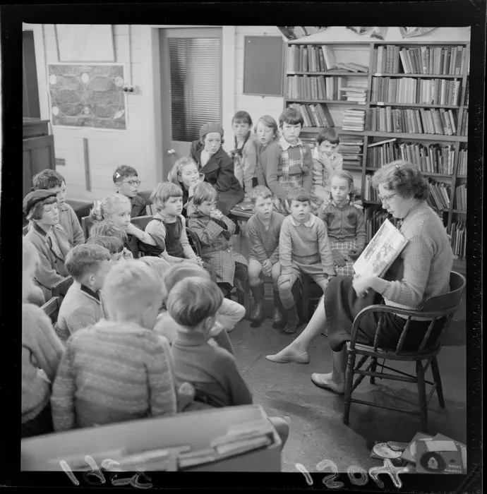 Mrs Patricia Green reading a book to a group of young children, Wadestwon Library, Wellington
