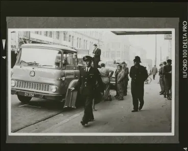 Image: Negative: People beside truck (copy)