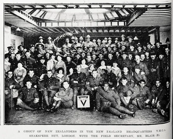 A group of New Zealanders in the New Zealand Headquarters YMCA Shakespeare Hut, London, with the field secretary, Mr Blair (x)