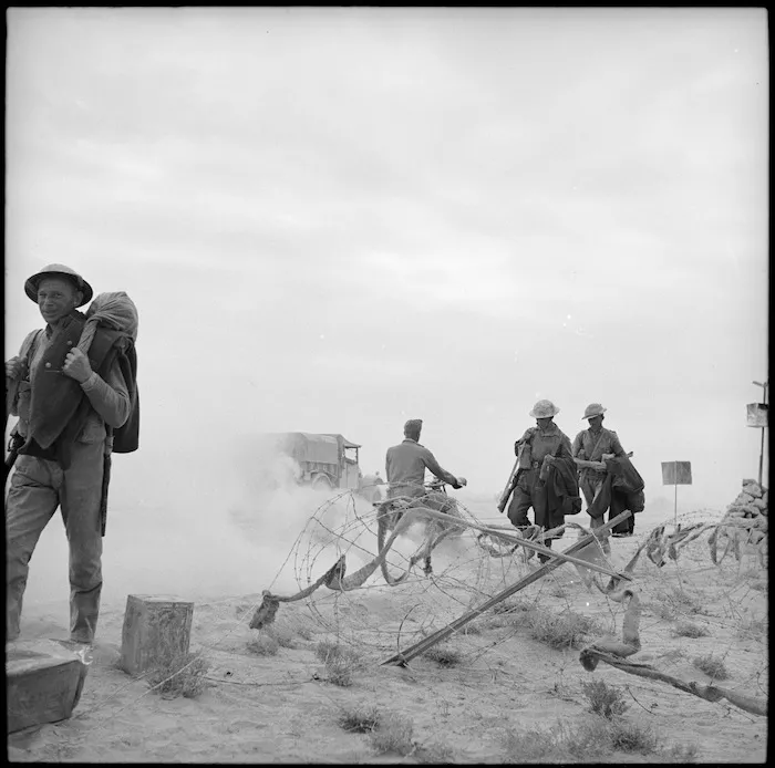 Convoy departs through gaps in defences, Egypt - Photograph taken by H Paton