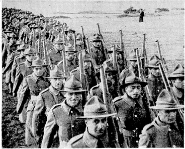 Image: Scenes at the celebrations on Tuesday marking the hundredth anniversary of'the signing of the Treaty of Waitangi, at which the Governor-General, Lord Galway, officially opened the neio Maori meeting house. Top left, his Excellency .speaking in front of the whare-runanga. Top right, Captain Hobson and Mr, Busby, leading characters in the re-enacting of the signing of. the Treaty. Below, members of the Maori Battalion marching to the ceremony. (Evening Post, 08 February 1940)