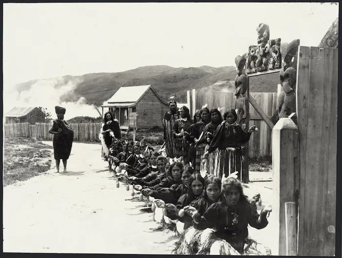 Maori women performing the canoe poi dance