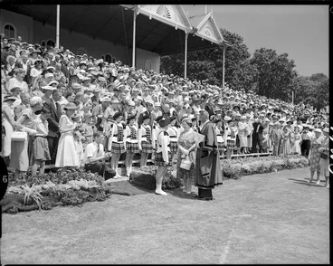 Image: Her Majesty Queen Elizabeth, the Queen Mother chats to members of the Scottish Hussars at the Civic welcome, The Domain, Auckland