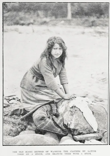 Image: The old Māori method of washing the clothes by laying them on a stone, and beating them with a stick