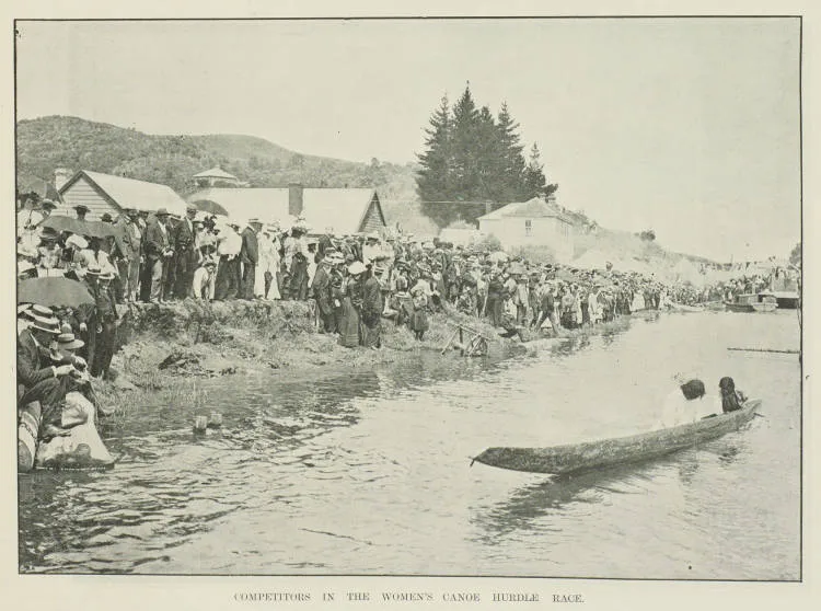 Competitors in the women's canoe hurdle race