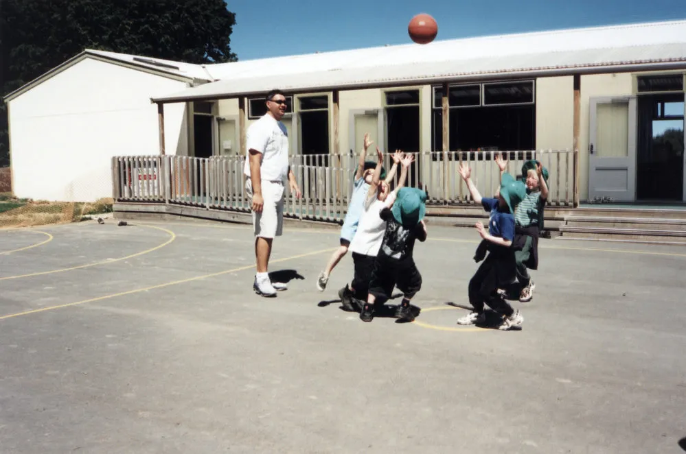 Mangaroa School; Olympic basketballer Peter Pokai on a coaching visit.
