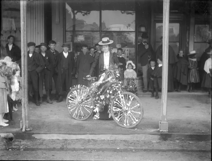 Woman with decorated bicycle