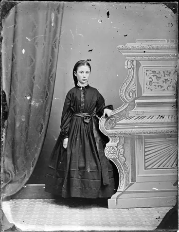 Image: Unidentified girl with fake piano background