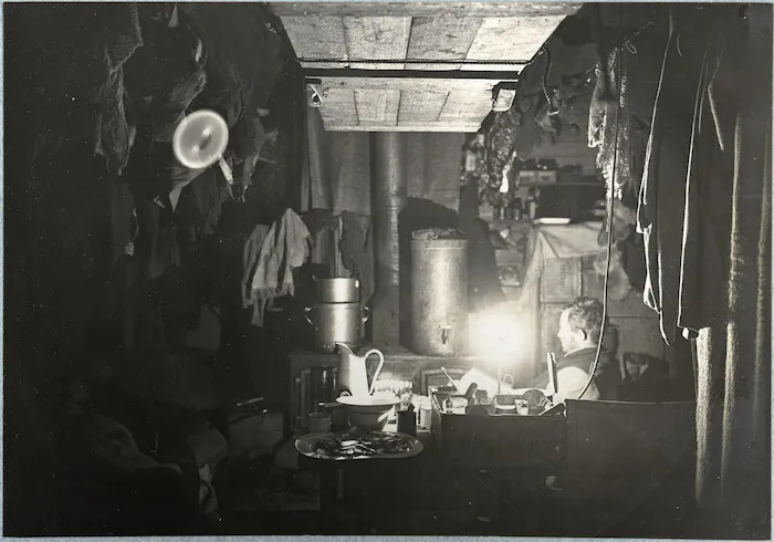 Douglas Mawson on night watch in Shackleton's hut at Cape Royds, Ross Island, Antarctica