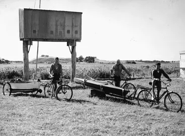 Image: Boys towing their boats home to Levin with bicycles
